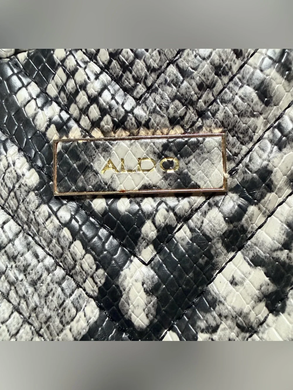 Aldo Black and Cream Snake-Print Mini Backpack